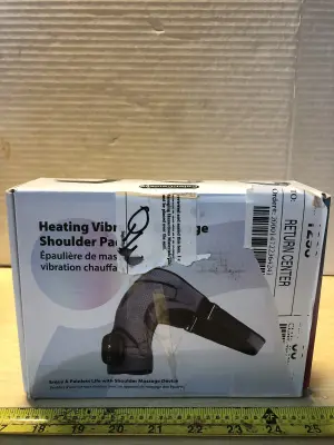 Heating vibrating shoulder massager comes on