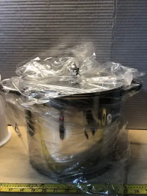 Large stainless steel pot with lid