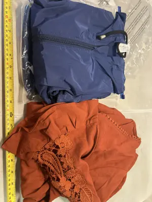 m shirt and rain jacket
