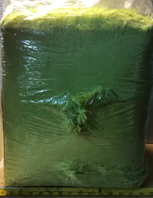 Unknown size green shag area rug