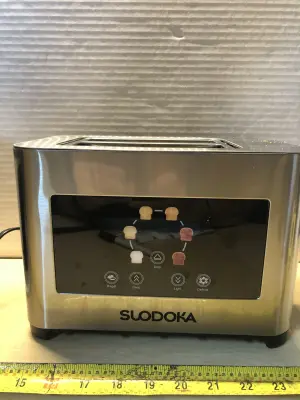 Dual slice toaster works used