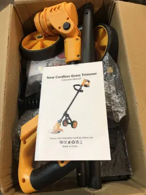 Cordless grass trimmer on wheels works