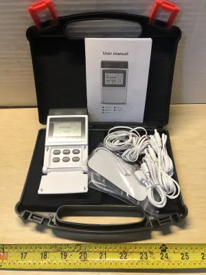Insmart 4 channel tens/ems muscle stimulator comes on