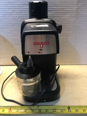 Reemix coffee maker used comes on