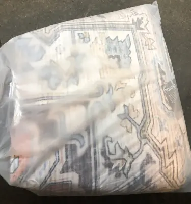 Unknown size area rug