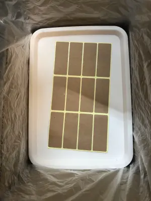 Box of plastic art trays