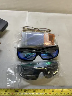 three sunglasses one reading glasses