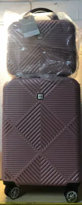2pc TripComp pink luggage on wheels