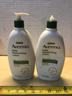 2 bottles 18oz Aveeno daily lotion lid on one broke