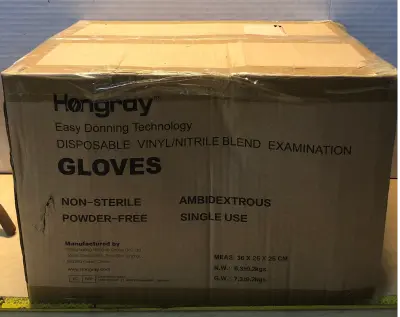 Box of medium sized vinyl powder free gloves