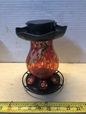 Solar powered humming bird feeder
