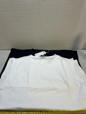 2 medium sleeveless shirts