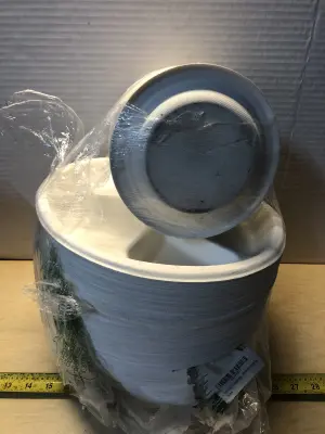 Stack of small disposable plates, stack of 4 compartment disposable plates
