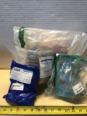 Lot of assorted candy mostly in date Spree bag ripped