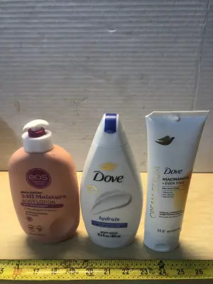 16oz eos body lotion, 15.2oz Dove body wash, 8oz Dove cream serum