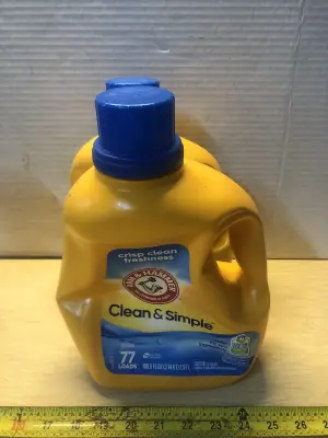 2 bottles 100.5oz arm&hammer laundry detergent some spilled out of both