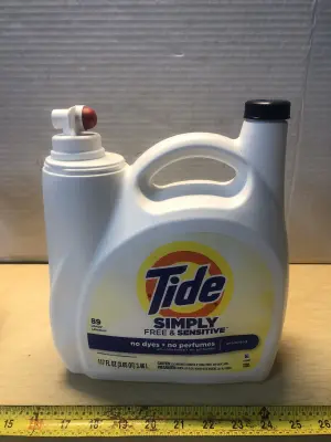 117oz Tide laundry detergent missing measuring cup