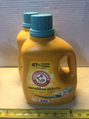 2 bottles 105oz arm&hammer laundry detergent one spilled some