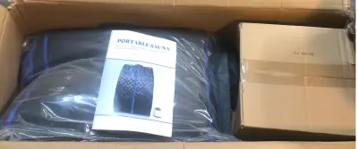 Portable sauna box opened as is