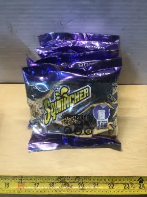 4 packs 23.83oz Grape Sqwincher drink mix