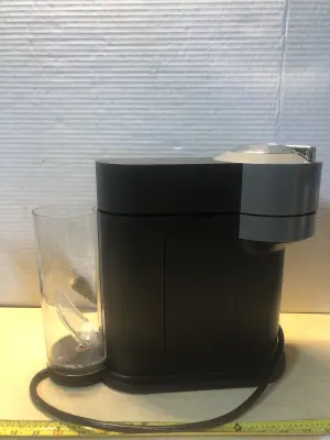 Nespresso coffee maker comes on used as is
