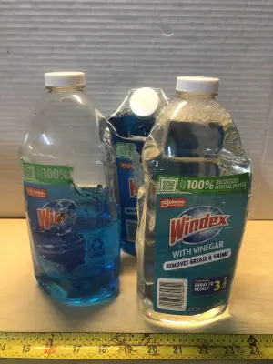 3 bottles 67.6oz Windex window cleaner some spilled