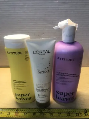 16oz Attitude shampoo, 8.5oz L’Oréal shampoo, 32oz Attitude shampoo