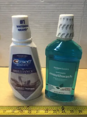 33.8oz Crest 3D white mouth rinse, 33.8oz Amazon basics antiseptic mouthwash