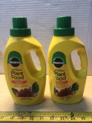 2 bottles 32oz miracle gro plant food