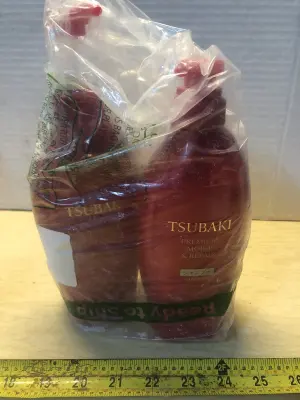 2 bottles Tsubaki shampoo and conditioner