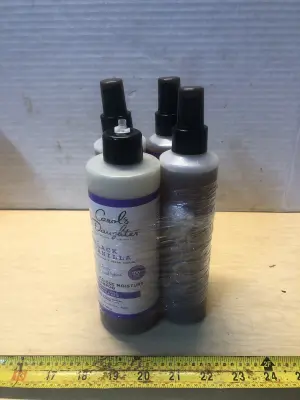 12oz carols daughter shampoo, 3 bottles 8oz carols daughter leave in conditioner cap broke
