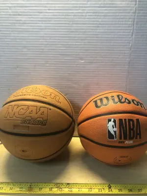 One leather Wilson basketball and NBA Wilson basket ball needs air