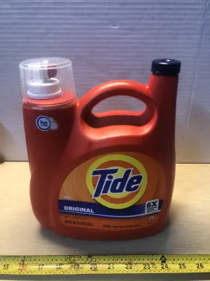 125oz Tide laundry detergent some spilled