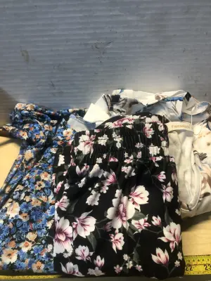 Shirt size large, skirt size small, dress size medium