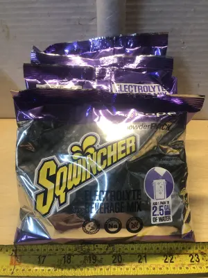 4 packs 23.83oz grape Sqwincher drink mix