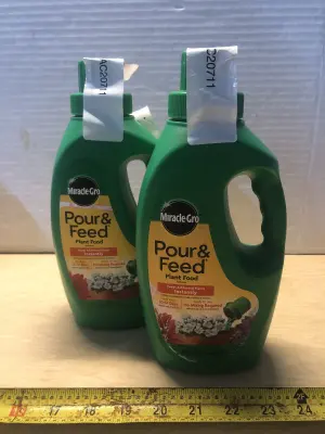 2 bottles 32oz miracle gro plant food