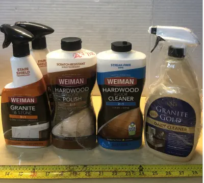 2 bottles 24oz Weiman granite and stone 3in1, 32oz Weiman hardwood floor polish, 32oz Weiman hardwood floor cleaner, 32oz granite gold daily cleaner
