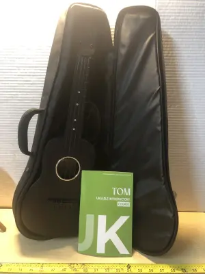 Tom ukulele and case