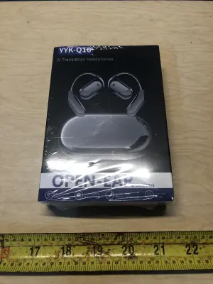 Open ear AI translation headphones