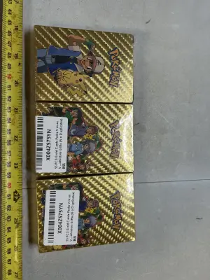 3 decks of pokemon playing cards