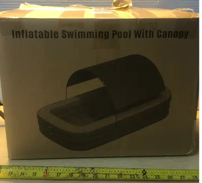 Inflatable swimming pool with canopy untested as is