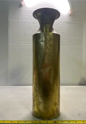 tall gold vase small dents