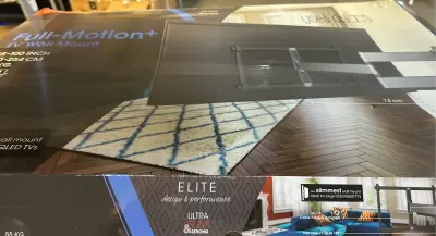 Full motion TV wall mount  used as is