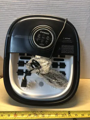 KNQUZE foot bath massager comes on