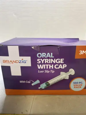 oral syringe with cap