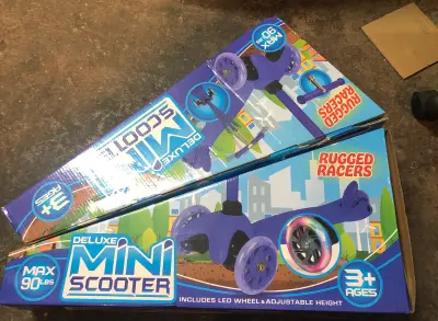 2 boxes rugged racers mini scooters
