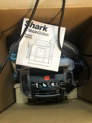 Shark stain striker comes on used as is