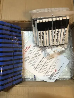 Box of dry erase boards with lines, comes with dry erase markers and erasers