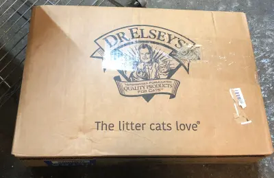 Heavy box of Dr. Elseys ultra cat litter box has been taped