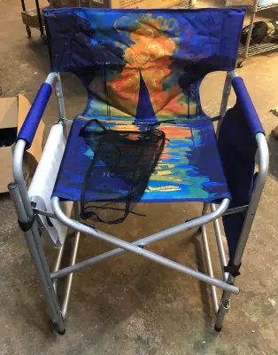 Tall folding chair in bag